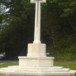 Finchampstead War Memorial, made of portland stone with a bronze cross.