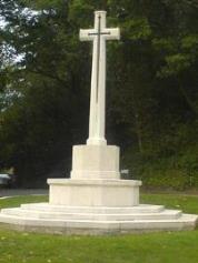 Finchampstead War Memorial, made of portland stone with a bronze cross.