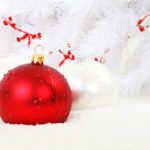 red shiny bauble on white background