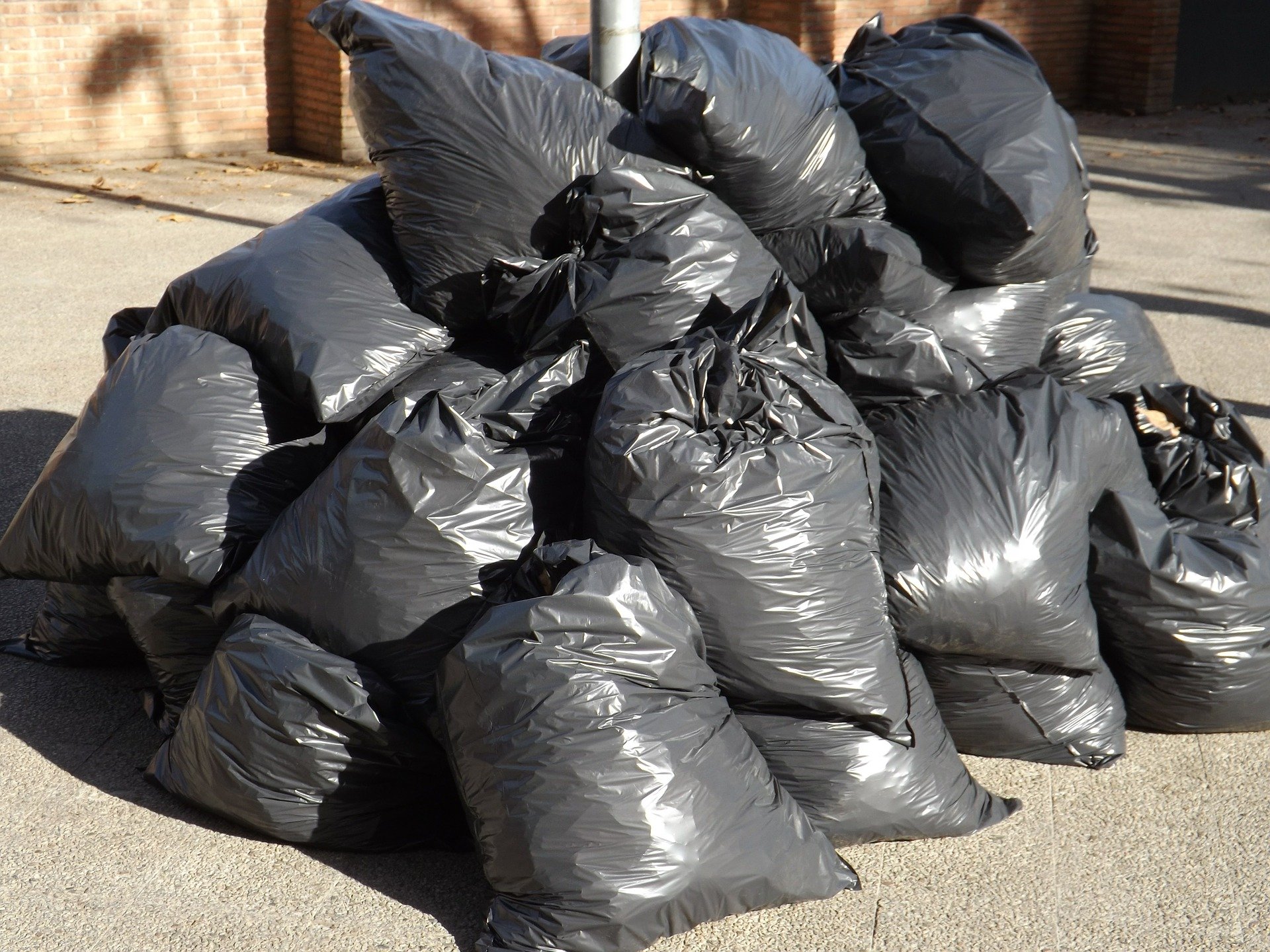 Heap of full black rubbish sacks