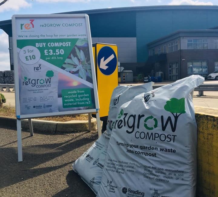 Bag of re3 compost with sign giving prices