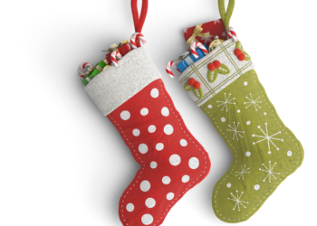 two christmas stockings filled with gifts